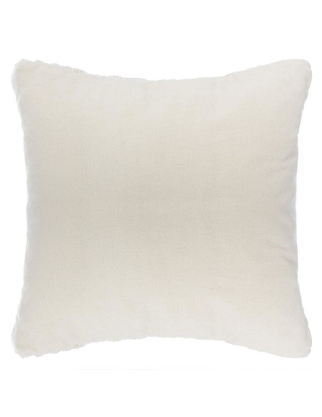 Cojín crema macramé en sofá moderno