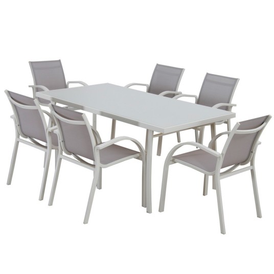 mesa de comedor exterior acero y cristal en terraza moderna