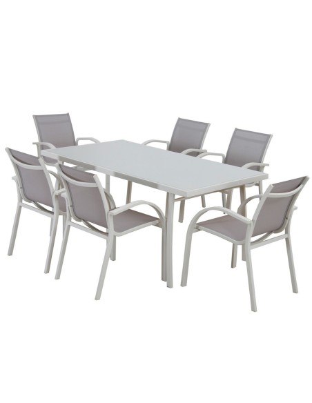 mesa de comedor exterior acero y cristal en terraza moderna