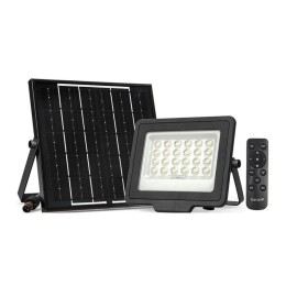 proyector solar LED 1200 lm iluminando jardín de noche