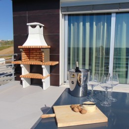 Barbacoa de obra L’Art con chimenea y encimera principal