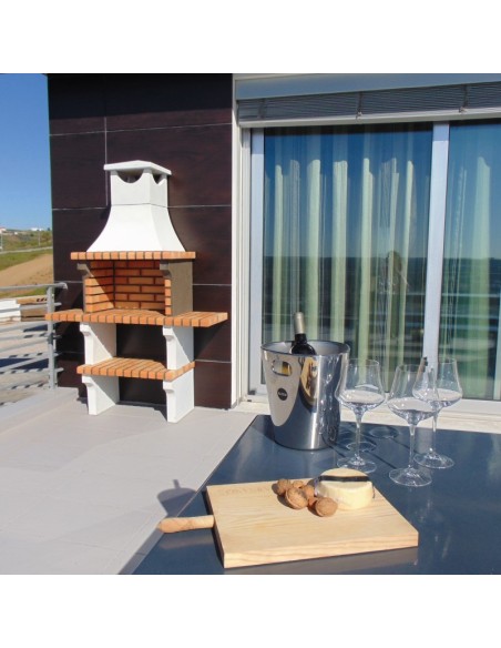 Barbacoa de obra L’Art con chimenea y encimera principal