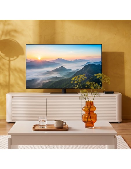 Mueble TV Tyndall arena y roble para televisores de hasta 75 pulgadas.